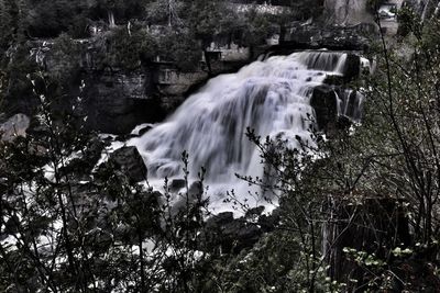 Blurred motion of waterfall in forest