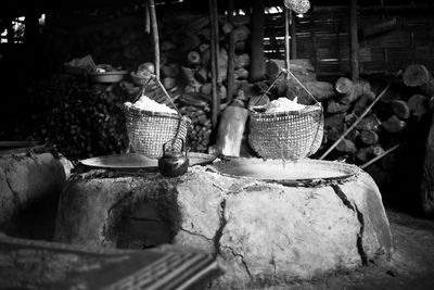 Baskets hanging over oven in market