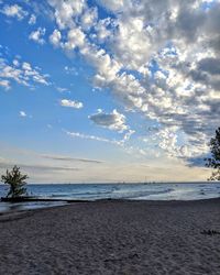 Scenic view of beach against sky