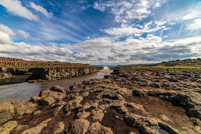 Scenic view of sea against sky on selfoss waterfall, island 