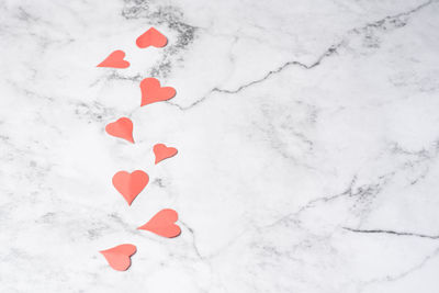 High angle view of heart shape on snow covered field