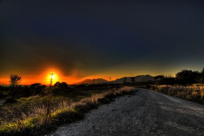 Scenic view of landscape against sky at night