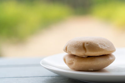 Close-up of bread in plate on table