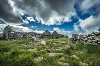 View of landscape against cloudy sky