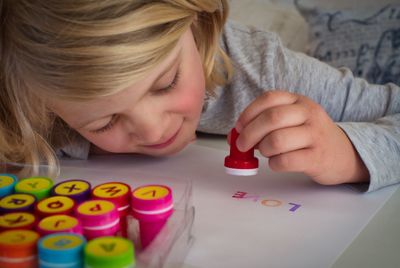 Portrait of girl with multi colored face