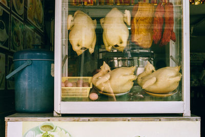 Close-up of chickens for sale in store