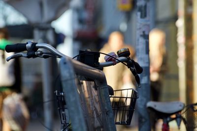 Close-up of bicycle parked on street
