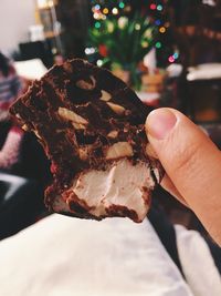 Cropped hand of person holding dessert