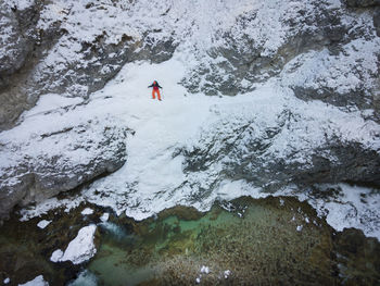 High angle view of person on snowcapped mountain