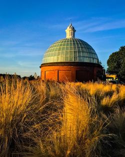 Sunset in greenwich. entrance to the river thames foot tunnel.