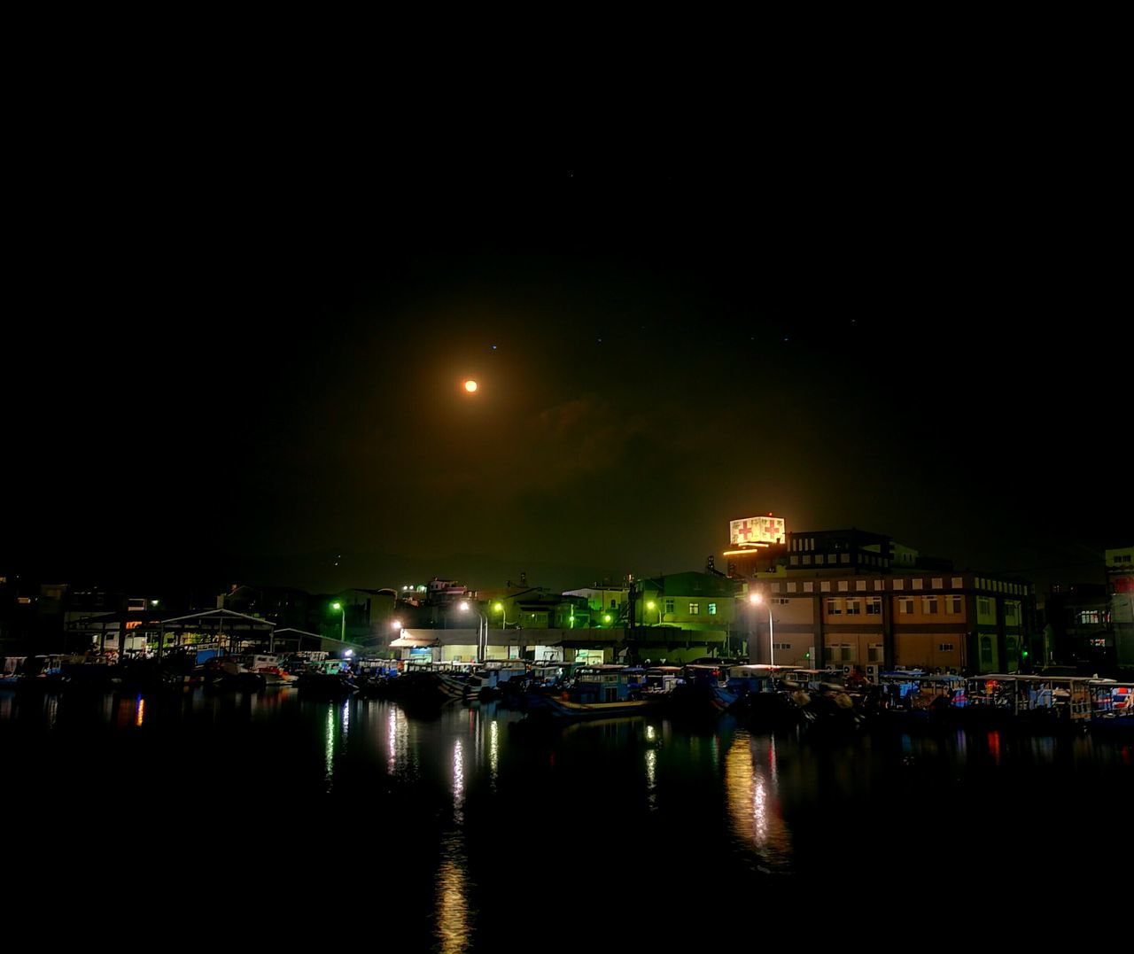 night, illuminated, reflection, architecture, water, built structure, waterfront, river, city, sky, building exterior, no people, bridge - man made structure, nautical vessel, travel destinations, outdoors, cityscape, nature, beauty in nature, star - space, astronomy