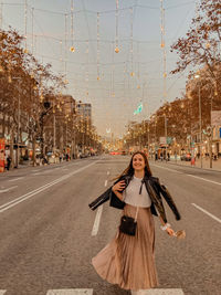 Rear view of woman walking on street