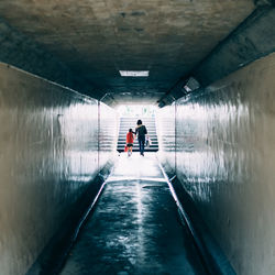 People walking in tunnel