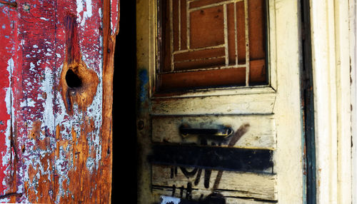 Close-up of weathered open door