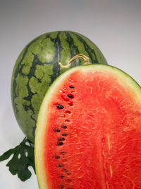 Close-up of watermelon against white background