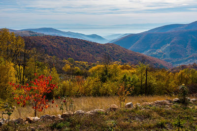 Scenic view of mountains against sky during autumn