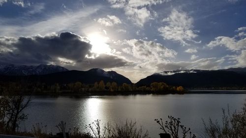 Scenic view of lake against sky during sunset