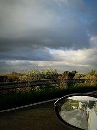 Road against cloudy sky