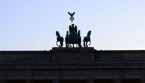 Low angle view of statue against clear sky