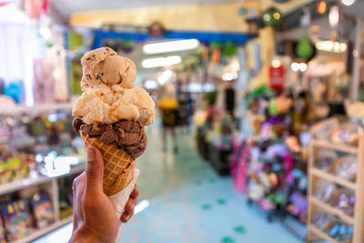 Woman holding ice cream cone