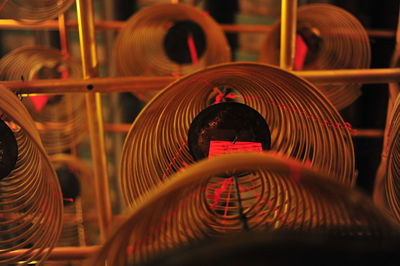 Close-up of spiral staircase at night