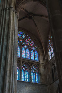 Low angle view of glass window in historic building