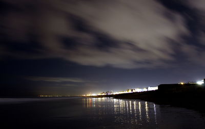 Scenic view of sea against sky at night