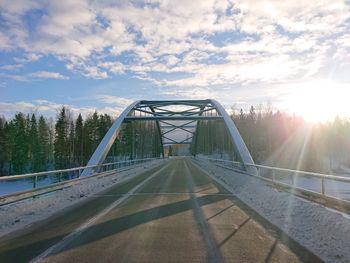 Footbridge against sky