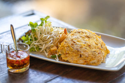 Close-up of breakfast served on table