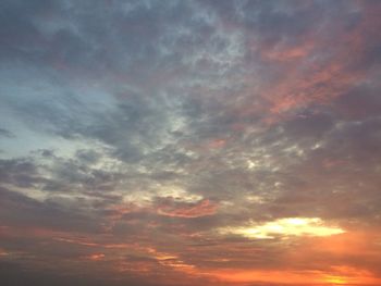 Low angle view of dramatic sky during sunset