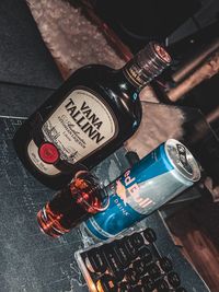 High angle view of bottles on table