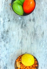 High angle view of oranges in bowl on table