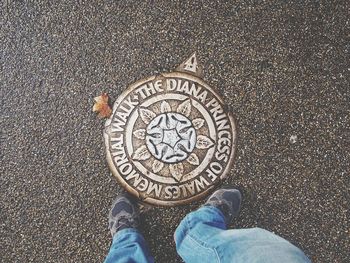 Low section of man standing in front of princess diana memorial walk