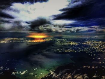 Scenic view of sea against cloudy sky