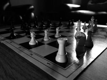 Close-up of chess board on table