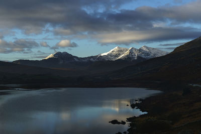 The snow-capped summit of snowdon in the snowdonia national park in north wales, uk