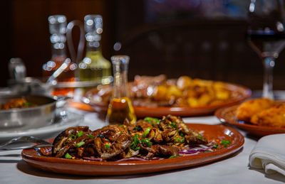 Close-up of food served on table