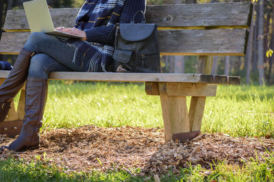 Low section of man working on field