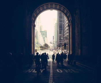 People in corridor of building