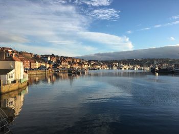 Scenic view of town against sky