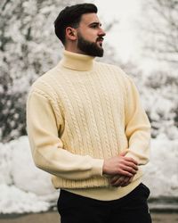 Young man wearing yellow sweater during winter