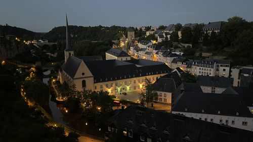 High angle shot of townscape against sky at night