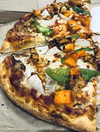 High angle view of pizza in plate on table