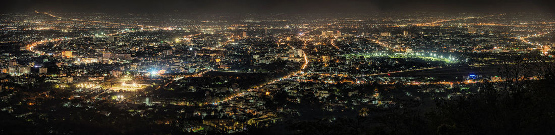 High angle view of illuminated city at night