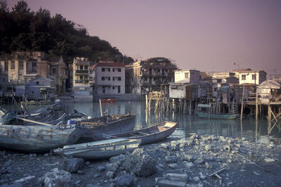 Boats moored at harbor