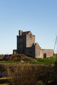 Low angle view of old ruins against clear sky