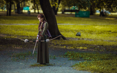 Woman standing on field