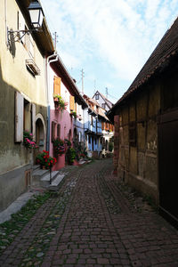 Street amidst houses in town