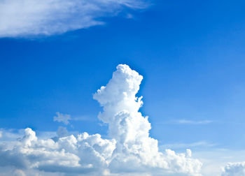 Low angle view of cloudscape against blue sky