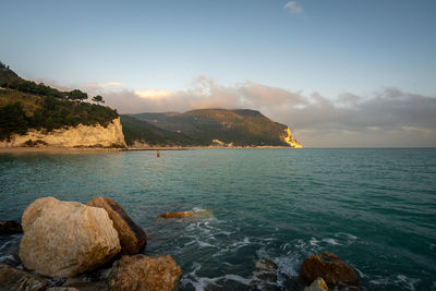 Scenic view of sea against sky during sunrise 